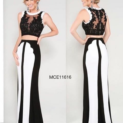 Two-piece formal gown with black beaded crop top and striped maxi skirt